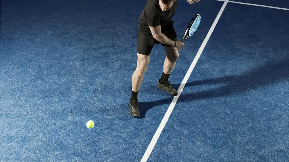 Padel player holding a racket on court